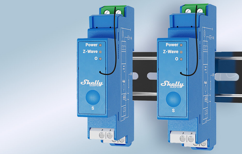Przekaźnik SHELLY Qubino Z-Wave Pro 1, skoki, napięcie, przekrój, siła, na niebieskim tle przekaźniki na szynie DIN frontem prawo skos