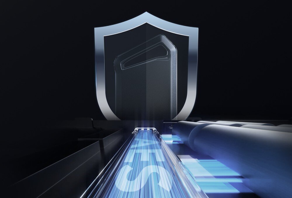 Dysk LEXAR SL600 Grafika przedstawiająca zarys dysku zewnętrznego umieszczony wewnątrz lśniącej tarczy. Na pierwszym planie widoczny jest świetlisty pas z napisem 'AES', symbolizujący szyfrowanie danych