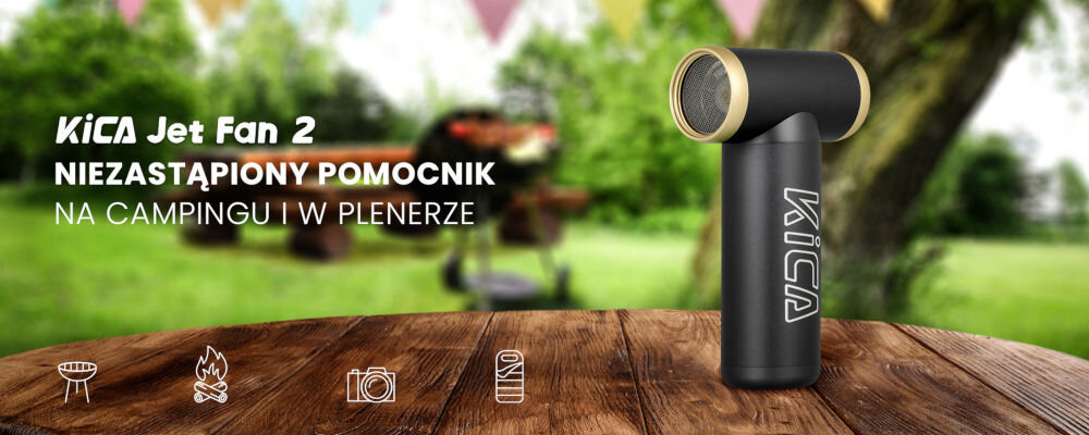 Dmuchawa wielofunkcyjna KiCA Jetfan 2 Kit Czarna czarna dmuchawa złote elementy urządzenie stoi na stole zielone ogrodowe tło funkcje dmuchawy i odkurzacza kompaktowe urządzenie (7,2 x 3,7 x 12,9 cm) praktyczna głowica odkurzająca efektywny system czyszczący potężny strumień powietrza do użytku w domu samochodzie warsztacie na biwaku