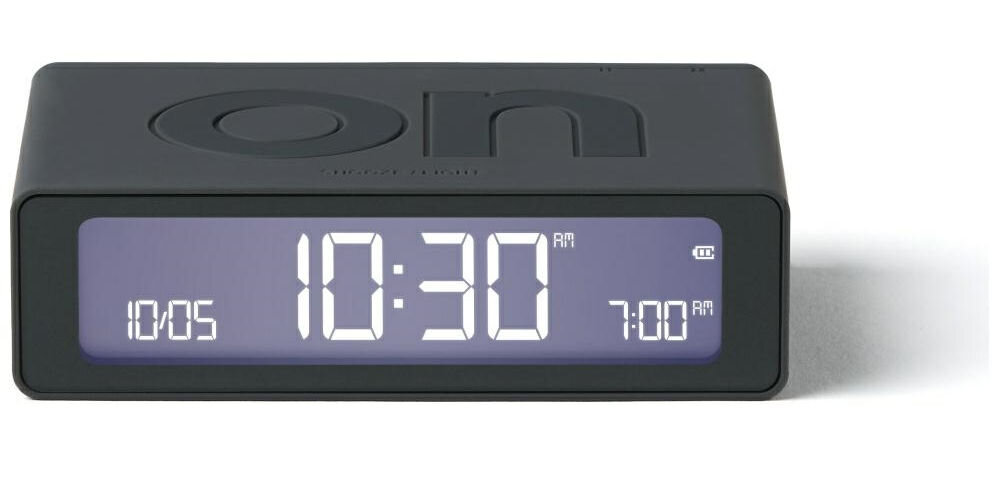 Budzik LEXON Flip Mini Ciemnoszary, dotyk, LCD, jasność, przyciski, Budzik Lexon Flip Mini w grafitowej wersji, ekran z białym podświetleniem, widok z przodu.