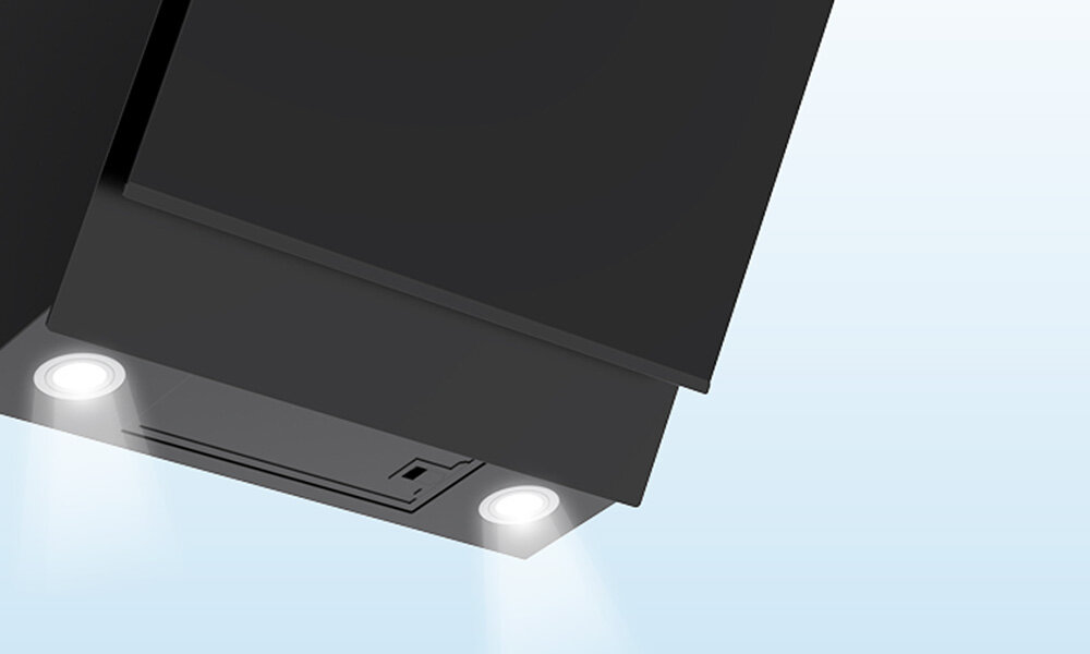 OKAP MIDEA MH60A4300B-ES Zdjęcie prezentuje spód okapu z włączonym oświetleniem LED. Dwa jasne punkty światła oświetlają przestrzeń roboczą pod urządzeniem światło oświetlenie LED jasne równomierne oszczędność energii 3W