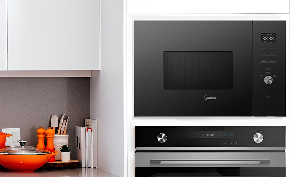 Kuchenka mikrofalowa MIDEA MBMTG925EBK 900W średnica 31.5 cm pojemność 25l Czarny wielofunkcyjne urządzenie, elegancki wygląd, pojemność 25 l, intuicyjne sterowanie