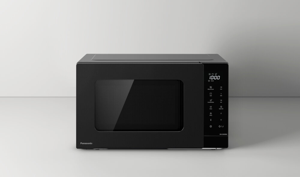 Czarna kuchenka mikrofalowa z panelem dotykowym i wyświetlaczem pokazującym godzinę 10:00. Na drzwiczkach widoczne jest logo Panasonic.