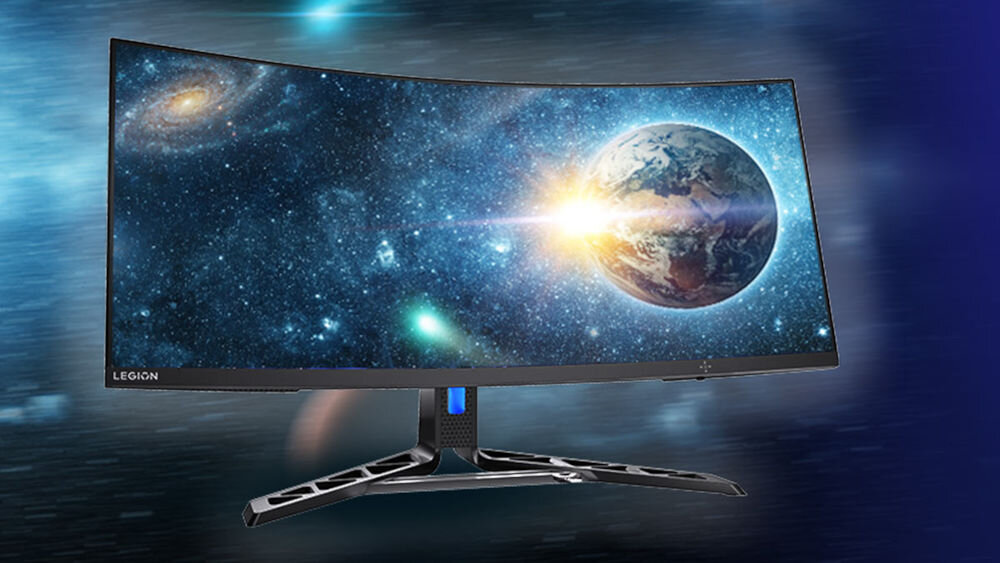 Monitor LENOVO Legion R34w-30 34 cali 3440x1440px 180Hz 0.5ms [MPRT] Curved prezentacja monitora na galaktycznym tle z przebłyskami światła rozdzielczość proporcje ekranu 21:9 szerokie pole widzenia głębia detale edycja materiałów wideo oglądanie filmów