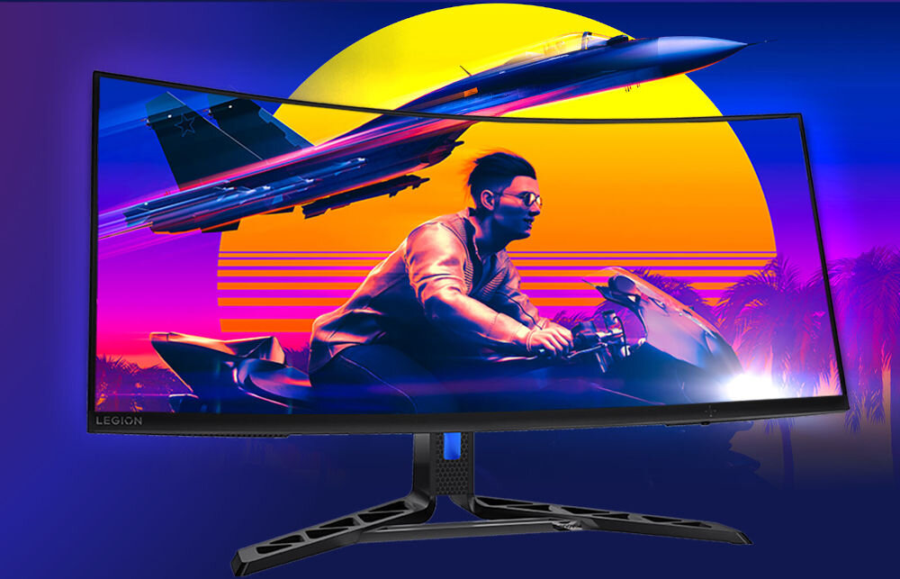 Monitor LENOVO Legion R34w-30 34 cali 3440x1440px 180Hz 0.5ms [MPRT] Curved prezentacja monitora na ekranie mężczyzna jadący na motocyklu w tle lecący samolot i słońce odświeżanie 180 Hz czas reakcji 0,5 ms MPRT dynamiczne sceny bez opóźnień i rozmyć komfort i precyzja działania