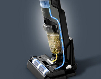 Przekrój zbiornika odkurzacza TEFAL X-Clean 4 z zanieczyszczeniami, niebieska linia symbolizująca czyszczenie.