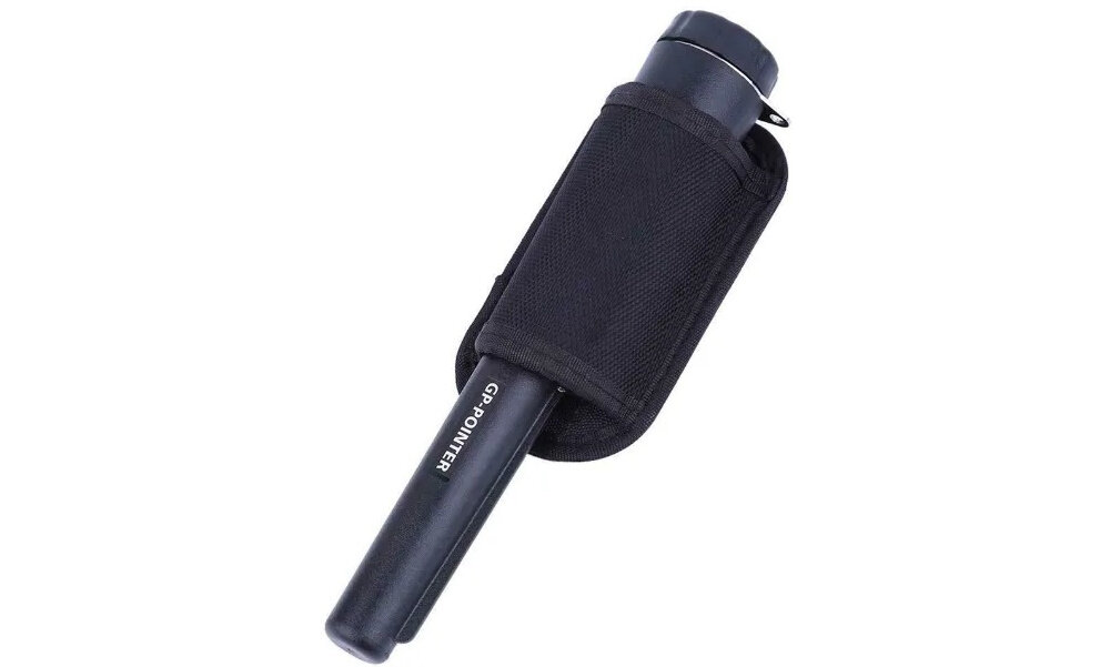 Wykrywacz metalu EXTRALINK GP-Pointer SA-980 Czarny wykrywacz na białym tle widoczny pod skosem pozwala szybko lokalizować ukryte przedmioty w glebie piasku na trawie dla amatorów i bardziej zaawansowanym poszukiwaczy niewielka konstrukcja z materiału ABS wygodna obsługa