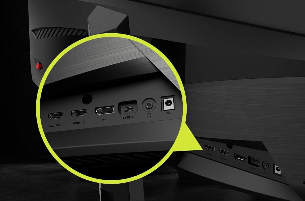 Monitor MSI MAG 321CUPDF Zbliżenie na panel w okrągłym powiększeniu, widać porty HDMI 1, HDMI 2, DP, TYPE-C, wejście słuchawkowe i zasilania