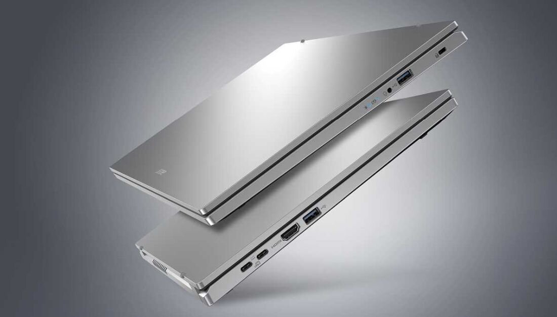 Dwa srebrne laptopy ACER Extensa 15 na szarym tle, prezentujące design i elegancję. - USB Type-C, USB-A, Wi-Fi 6 i Bluetooth 5.2