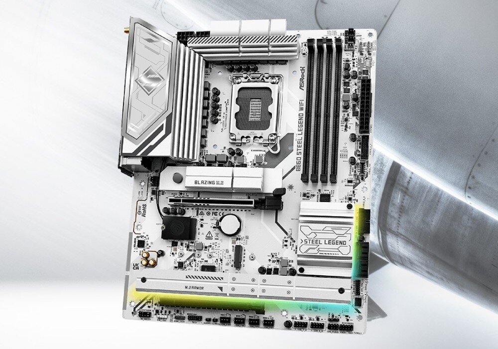 Płyta główna ASROCK B860 Steel Legend WiFi Widok z góry na całą płytę główną o białej kolorystyce z widocznymi portami i gniazdem procesora na szarym tle