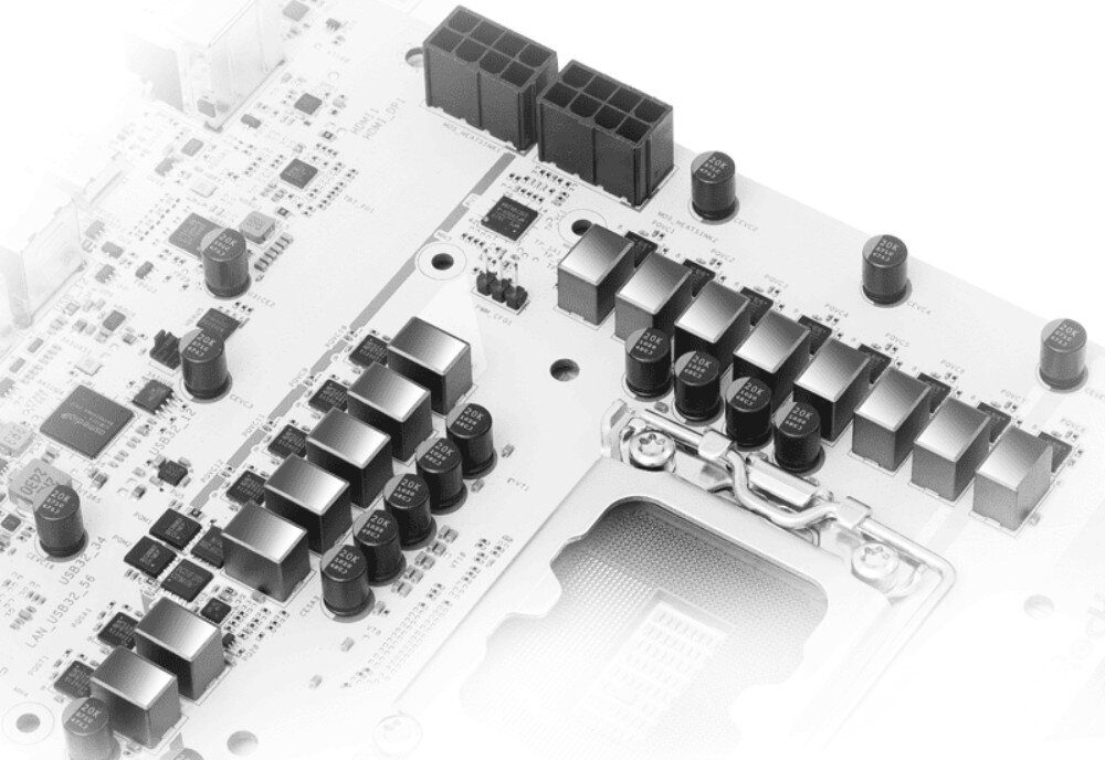 Płyta główna ASROCK B860M Steel Legend WiFi Zbliżenie na sekcję zasilania płyty z szeregiem kondensatorów i elementów chłodzenia w postaci metalowych radiatorów