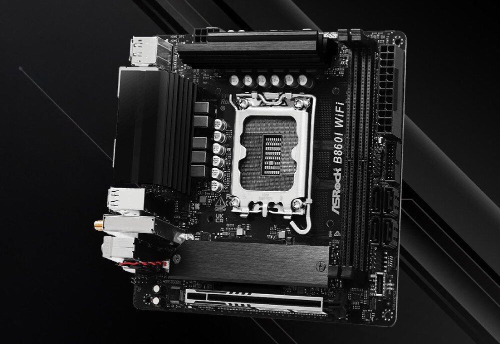 Płyta główna ASROCK B860I WiFi Widok z góry na czarną płytę główną w formacie ITX z centralnie umieszczonym gniazdem procesora, radiatorami oraz dwoma gniazdami pamięci RAM