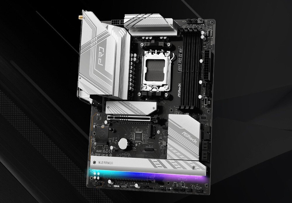 Płyta główna ASROCK B850 Pro RS WiFi Widok płyty głównej z gniazdem procesora, czterema slotami pamięci i aluminiowymi radiatorami w odcieniach srebra na czarnym tle, opis