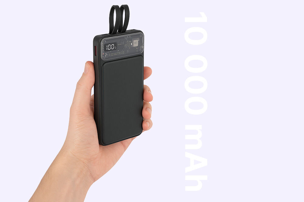 QUALO Transparent power bank 10000 mAh PD z LED 23W czarny QTPB10-LD-23-01 10000 mAh pojemności kompaktowe i wygodne urządzenie ukazane jak leży w ręce