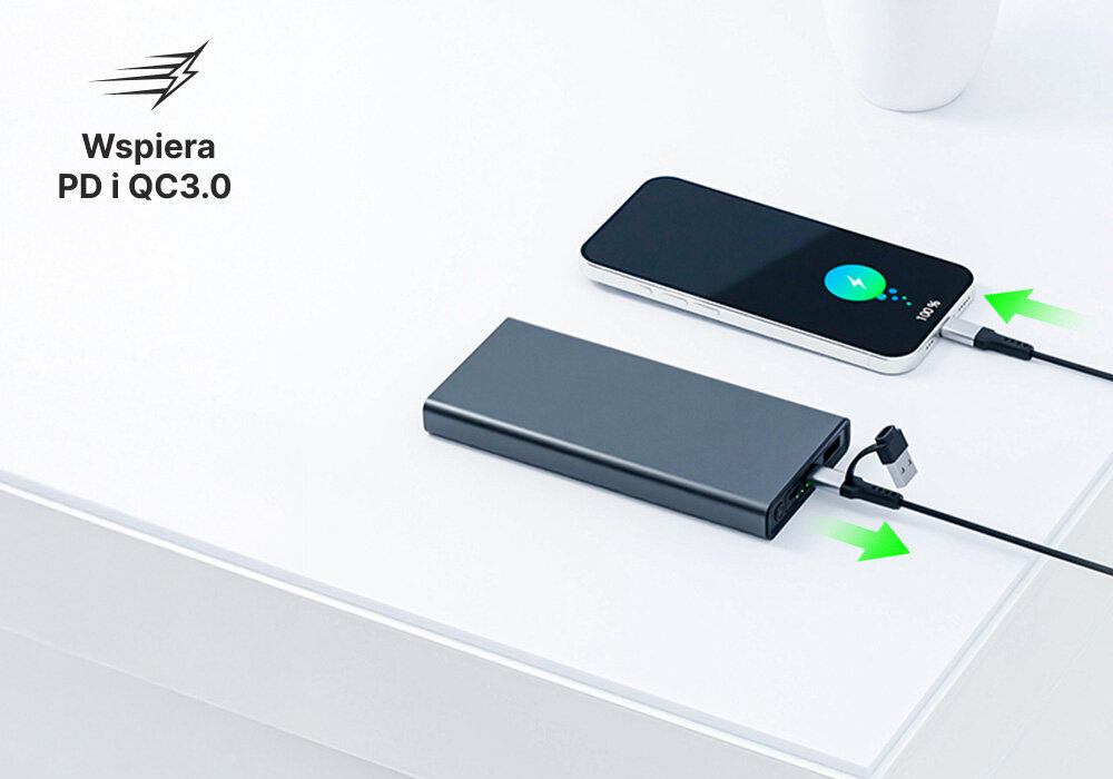 Powerbank QUALO Recycling QRPB5-12-18 5000 mAh Szary, Szybkie ładowanie, Na zdjęciu powerbank oraz smartfon leżą na blacie z podpiętymi do siebie kablami, w tle napis Wspiera PD i QC3.0