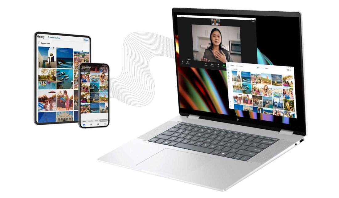 Laptop HP Envy x360 z telefonem obok i zdjęciem na ekranie, ilustrujący codzienną pracę z technologią. Intel Unison Kamera o rozdzielczości 5 MP