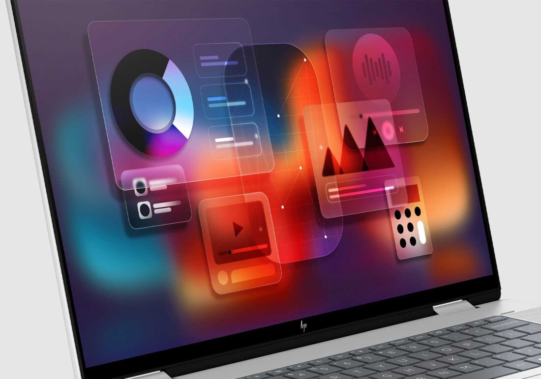 HP Envy x360 z jasnym, kolorowym ekranem i żywym tłem. Przestrzeń barw RGB DCI-P3 z 100% HDR 500 