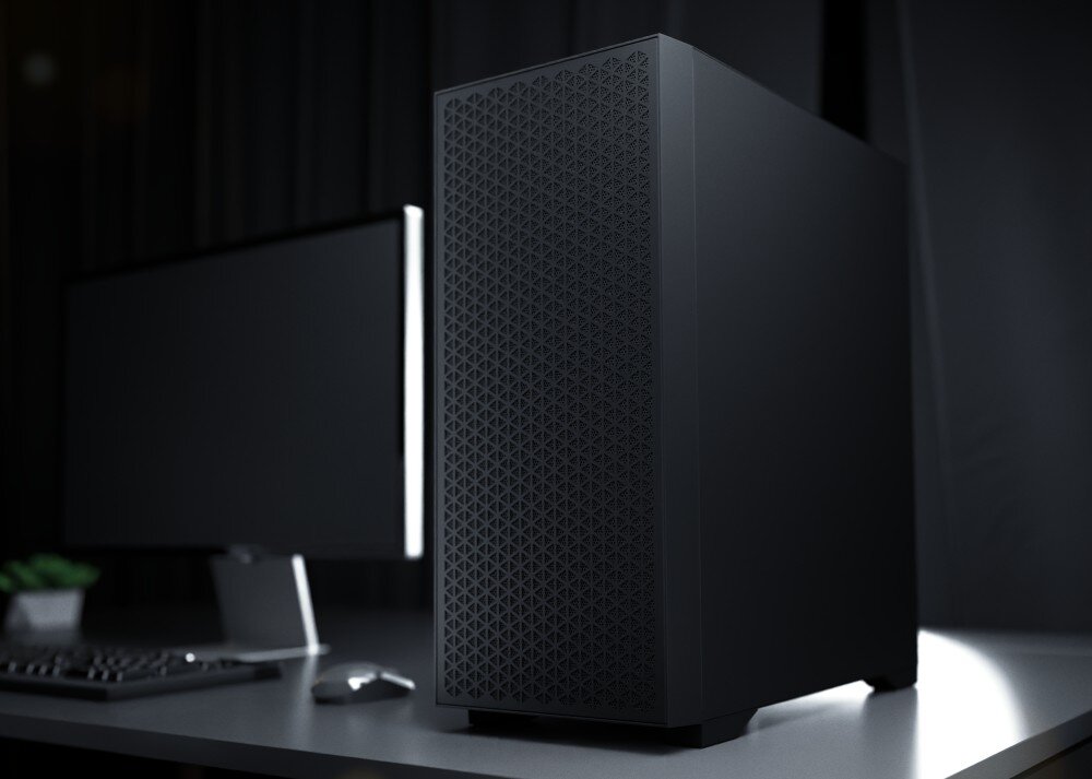 Obudowa LOGIC Dart Pro Solid Midi Ciemna obudowa komputera stacjonarnego ustawiona na biurku obok monitora, klawiatury i myszy w przyciemnionym pomieszczeniu, opis
