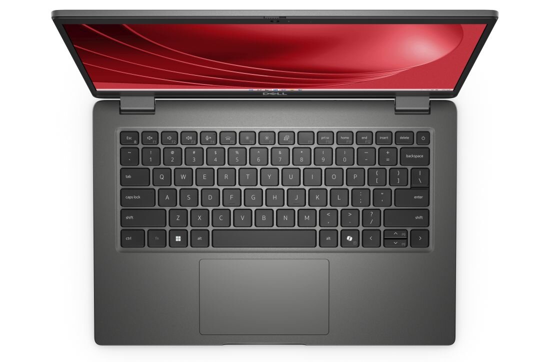 Widok z góry na podświetlaną klawiaturę laptopa DELL Latitude z blokiem numerycznym i dużym touchpadem, ekran z czerwonym motywem Windows 11 uchylony. - Podświetlana klawiatura  