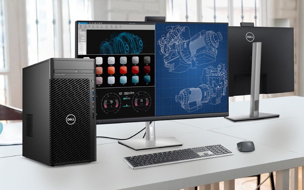 Komputer DELL Precision 3680 MT Biurko w przestrzeni biurowej z komputerem stacjonarnym i dwoma monitorami. Na ekranach wyświetlone są projekty techniczne i wykresy, karta graficzna, pamięć RAM, banki pamięci