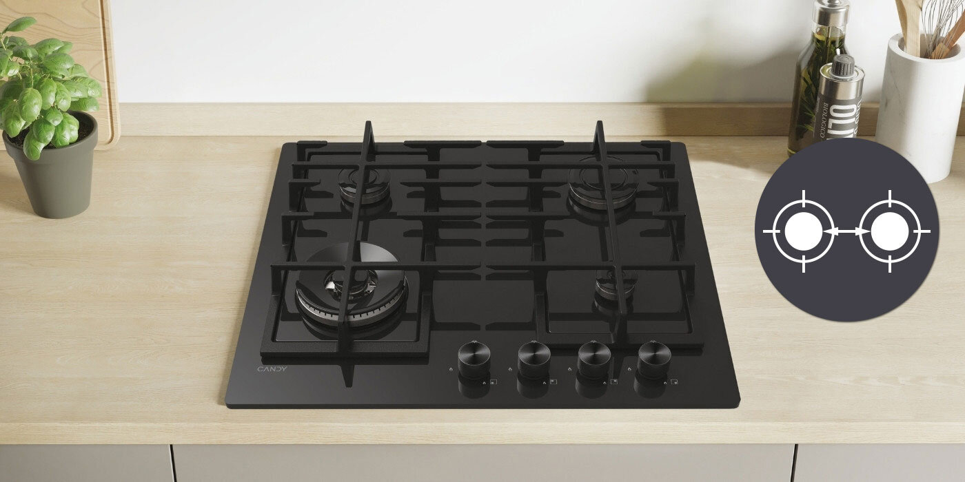 PŁYTA CANDY CVFG6BF4PB lifestyle wizualizacja ikona kuchnia blat pokrętła roślina dekoracje Szeroki rozstaw palników 4 pola dużo miejsca
