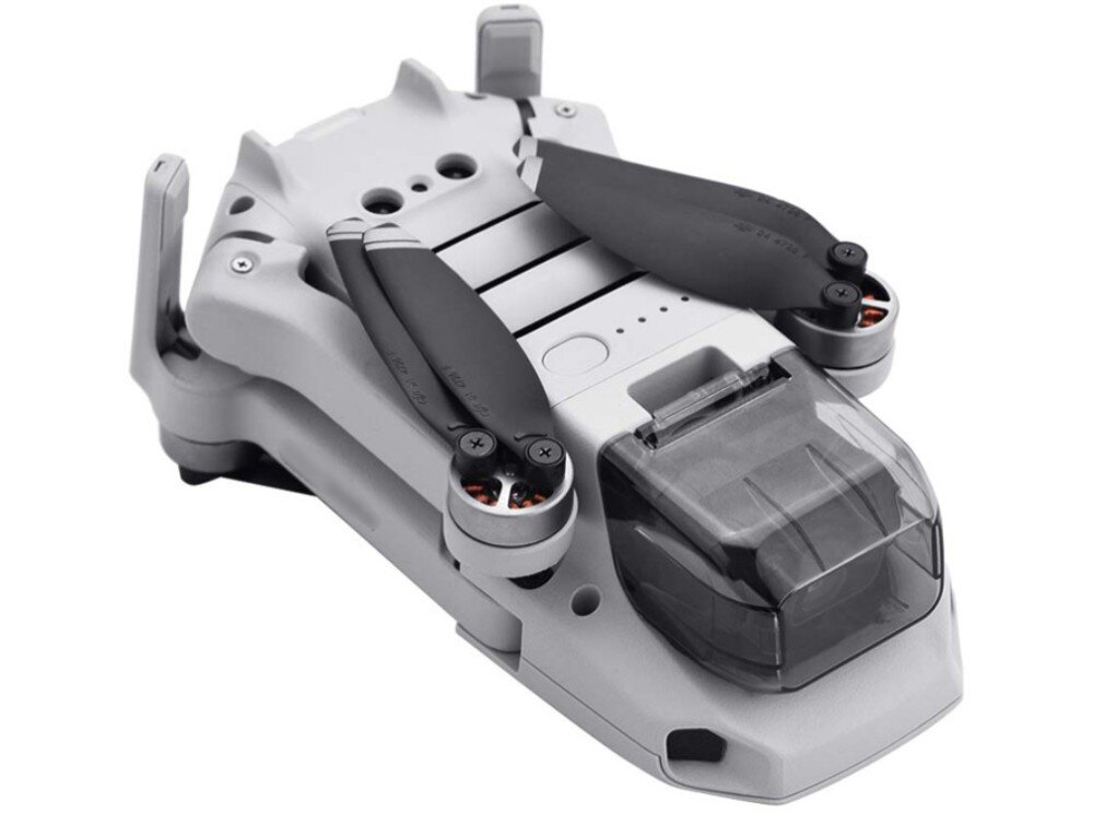 Osłona na obiektyw POTENSIC AT-Protector do Potensic Atom Złożony szary dron Potensic Atom z zamontowaną na przedzie przezroczystą osłoną, chroniącą obiektyw kamery i gimbal, widoczne są również złożone czarne śmigła na górze korpusu