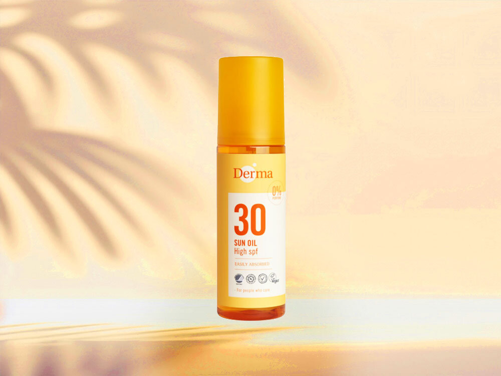 Olejek słoneczny DERMA SUN SPF 30 150 ml jasno żółte tło cień na ścianie żółte opakowanie pomarańczowa zakrętka ochrona przed słońcem
