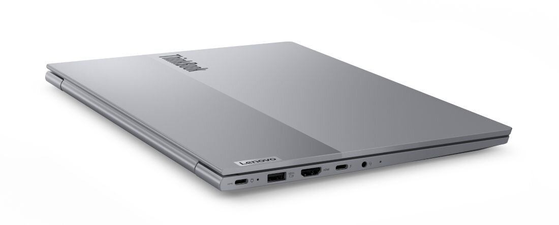 Porty i złącza w laptopie Lenovo ThinkBook 14 – szczegółowy widok na porty Thunderbolt 4, USB-A, HDMI i gniazdo audio w smukłej, srebrnej obudowie . - Thunderbolt 4, USB-A, HDMI