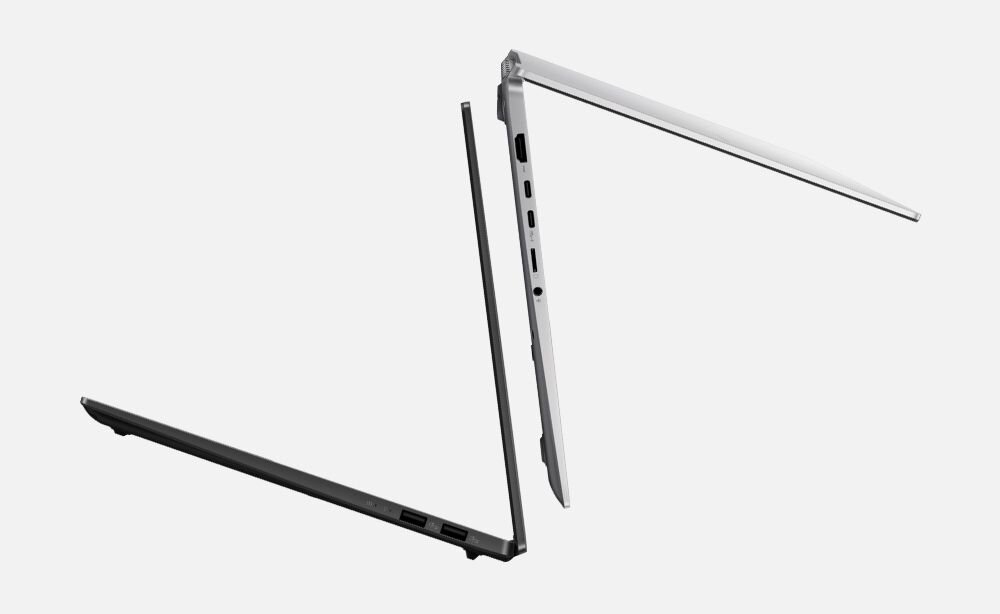 Dwa laptopy ASUS Vivobook S 16 OLED w kolorach czarnym i srebrnym, ustawione pod różnymi kątami na jasnym tle, prezentujące smukły profil i elegancki design, podkreślające mobilność i wszechstronność urządzeń do pracy i rozrywki. - smukła konstrukcja niewielka waga