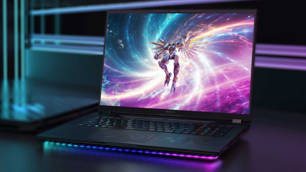 Laptop GIGABYTE Aorus Master 18 - Laptop GIGABYTE Aorus Master 18 z ekranem, na którym widoczny jest kolorowy obraz, łączący wydajność z estetyką. Intel Core Ultra 200HX, NVIDIA GeForce RTX 50, OLED, Dolby Vision i Dolby Atmos, WINDFORCE Infinity EX, WINDFORCE Infinity EX, Windows 11
