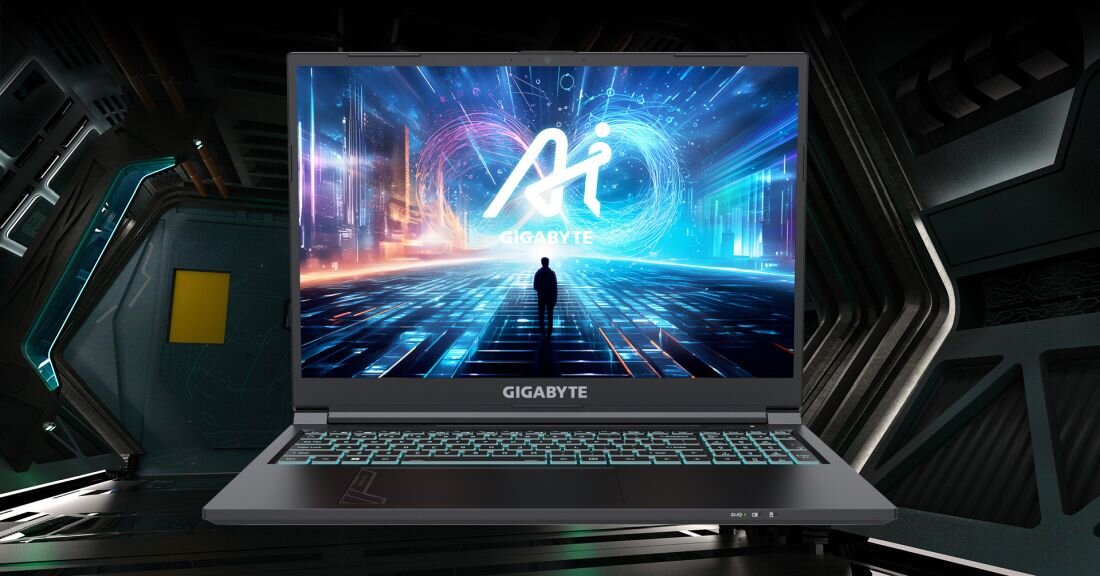 Laptop GIGABYTE G6 z podświetlaną klawiaturą w kolorze niebieskim wyświetlający logo AI na ekranie w futurystycznym środowisku z efektami świetlnymi - Opis serii G6