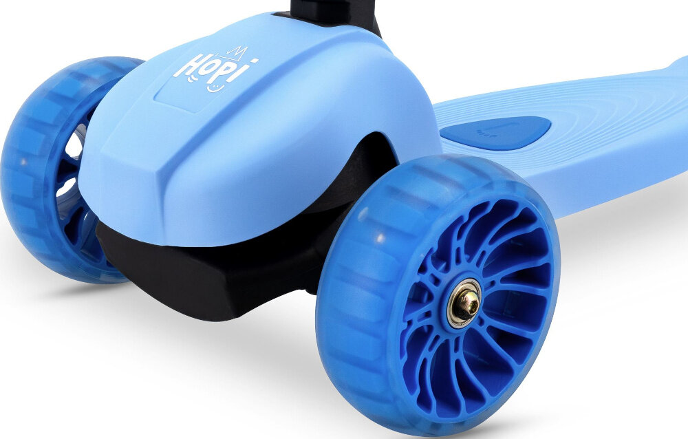Hulajnoga dla dzieci SPOKEY Hopi Niebieski zbliżenie na przednie kółka kółka z poliuretanu (PU) o średnicy 100 mm z przodu i 70 mm z tyłu łożyska ABEC-7 stabilna i płynna jazda materiał ogranicza ścieranie wspiera komfort dziecka ułatwia naukę jazdy bezpieczeństwo