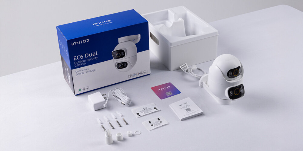 Kamera IMILAB EC6 Dual Zewnętrzna, Wi-Fi, Kamera obrotowa zawartość całego zestawu na jasnym tle w zestawie kamera zasilacz sieciowy 110-220 V kabel zasilający o długości 3 metrów ze standardową wtyczką elementy montażowe instrukcja obsługi