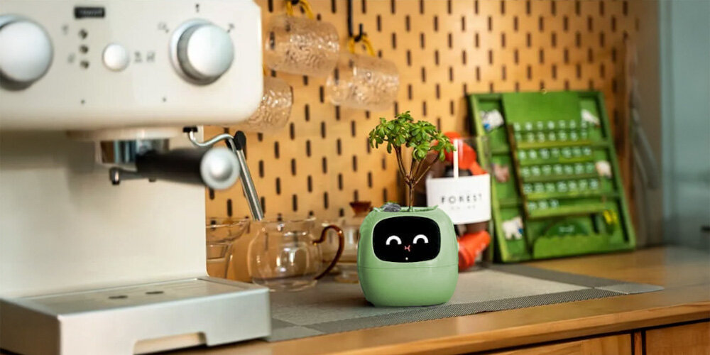 Doniczka inteligentna PLANTSIO IVY Wi-fi Zielony doniczka ustawiona na blacie estetyczna trwała wymiry 114 x 100 x 96 mm silikonowa podkładka stabilność funkcjonalność elegancja zapobiega rysowaniu powierzchni