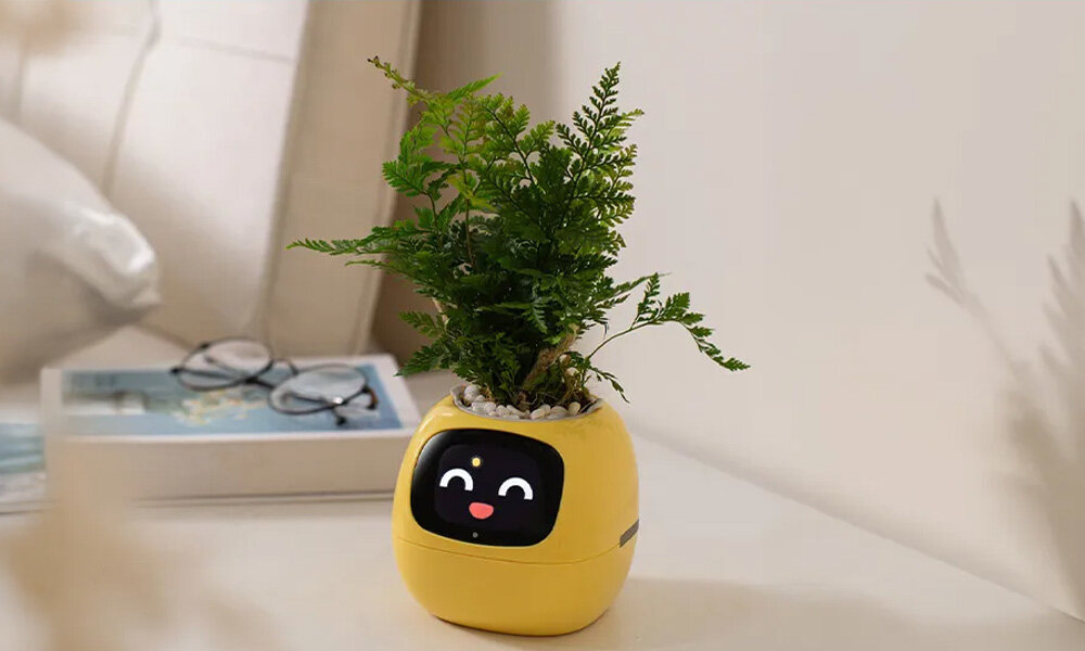 Doniczka inteligentna PLANTSIO IVY Wi-fi Żółty doniczka ustawiona na blacie estetyczna trwała wymiry 114 x 100 x 96 mm silikonowa podkładka stabilność funkcjonalność elegancja zapobiega rysowaniu powierzchni