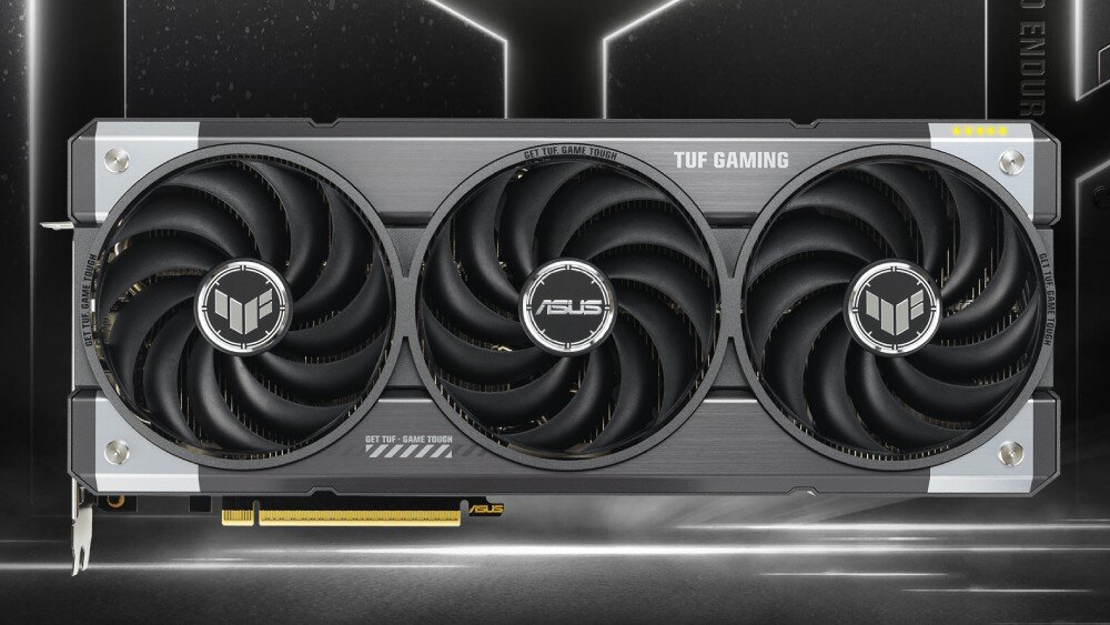 Karta graficzna ASUS TUF Gaming GeForce RTX 5070 Ti GDDR7 16GB Grafika przedstawia kartę graficzną w wersji TUF Gaming o industrialnym wyglądzie. Opis.