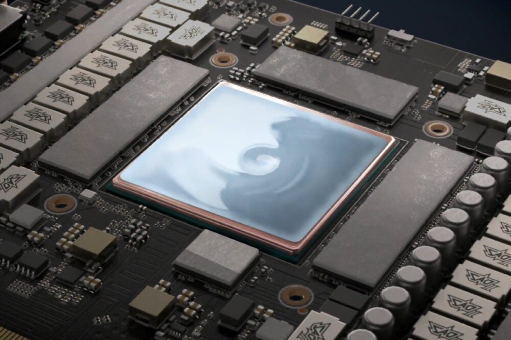 Karta graficzna ASUS GeForce RTX 5080 Prime 16GB Zbliżenie na układ chłodzenia GPU z warstwą termopadu, rozprowadzającego ciepło po powierzchni chipu