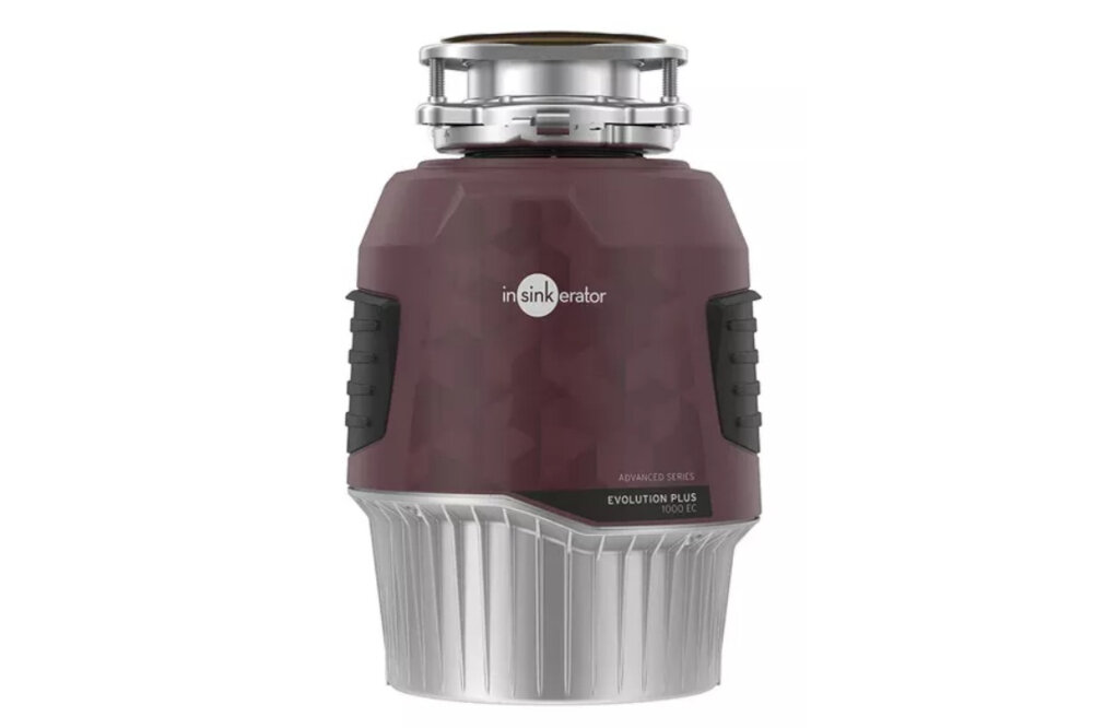 MŁYNEK DO ROZDRABNIANIA ODPADÓW INSINKERATOR EVOLUTION PLUS Zbliżenie na rozdrabniacz odpadów InSinkErator na jasnym tle. Widoczna jest górna część mocowania oraz logo producenta 3 SoundSeal technologia wyciszania cicha praca redukcja hałasu i wibracji