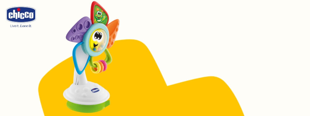 Zabawka edukacyjna CHICCO Baby Senses Kolorowy wiatraczek 00009710000000 biało żółte tło zabawka stoi bokiem różne tekstury namalowana buźka grzechotka różnorodne elementy wspiera rozwój zdolności manualnych i zmysłów dziecka obrotowe elementy różne faktury dźwięki odkrywanie otaczającego świata