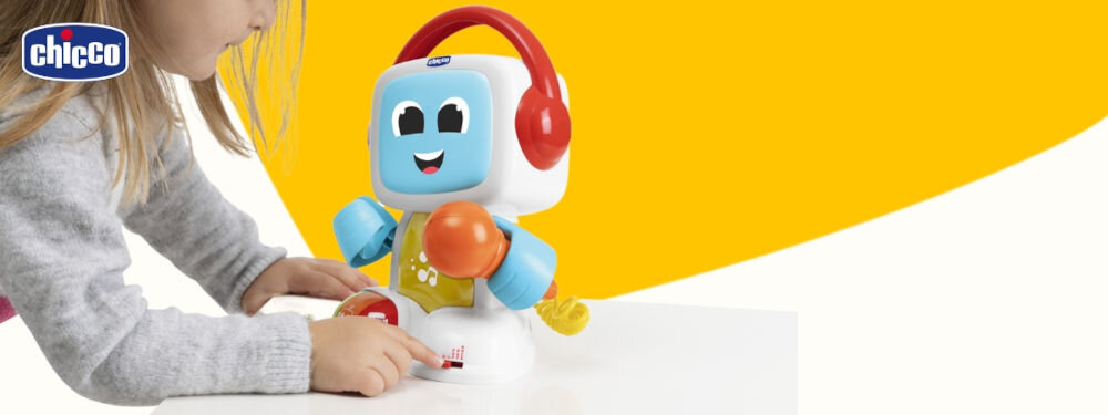 Zabawka edukacyjna CHICCO Happy Music Śpiewający robot Robit 00011853000000 biało żółte tło dziecko przesuwa suwak znajdujący się na nodze robota kolorowa zabawka robot z czerwonymi słuchawkami prawdziwy muzyczny towarzysz wbudowany mikrofon śpiewanie do wstępnie nagranych podkładów muzycznych zabawa w karaoke włączenie różnych gatunków muzycznych POP, RAP i ROCK tryb MUTE ćwiczenie umiejętności wokalnych