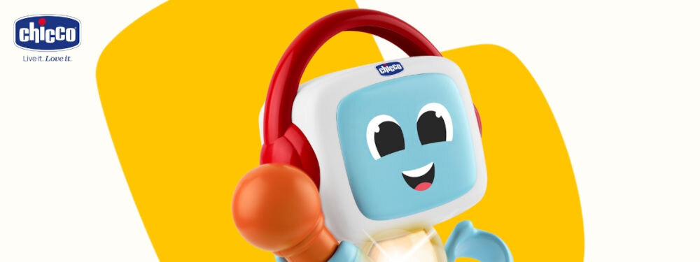 Zabawka edukacyjna CHICCO Happy Music Śpiewający robot Robit 00011853000000 zbliżenie na głowę robota uśmiechnięta mina czerwone słuchawki pomarańczowy mikrofon biało żółte tło wygodne przenoszenie uchwyt na górze do zabawy w różnych miejscach zabawa rozwój umiejętności