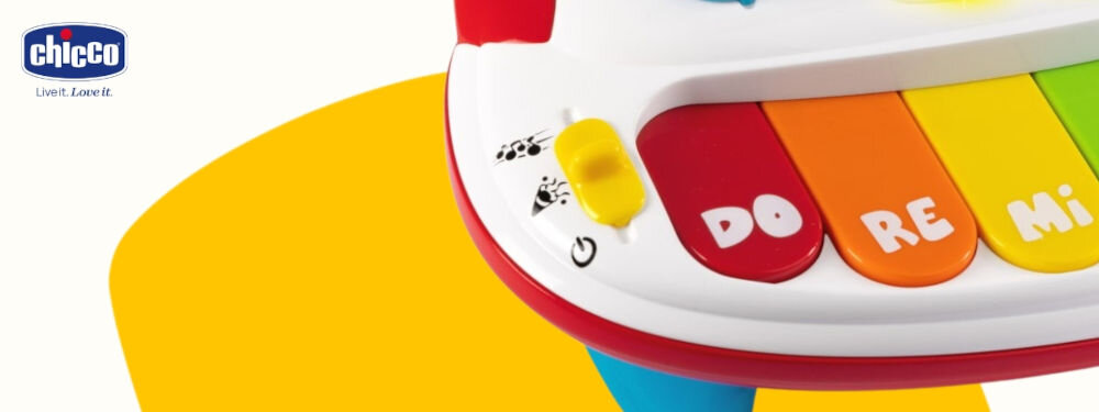 Zabawka pianino CHICCO 00012242000000 biało żółte tło zbliżenie na żółty suwak ilustracje obok suwaka 5 różnych instrumentów muzycznych do wyboru eksperymentowanie z różnymi dźwiękami i tworzenie brzmień rozwija wyobraźnię i kreatywność dziecka nauka rozróżniania rodzajów dźwięków wybór instrumentu nauka zabawa prawdziwy muzyk 