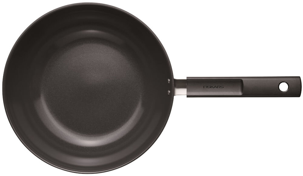 Patelnia wok FISKARS Hard Face 1075523 28 cm białe tło zdjęcie od góry czarna patelnia powłoka rączka z wysokiej jakości aluminium w pełni pochodzącego z recyklingu dla świadomych użytkowników minimalizuje wpływ na środowisko trwałość odporność na intensywne użytkowanie solidna konstrukcja równomierne rozprowadzanie ciepła