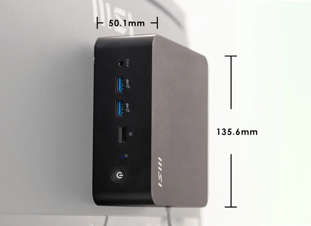 Komputer MSI Cubi NUC 13MQ-062EU Komputer mini PC przymocowany z tyłu monitora z oznaczeniami wymiarów 135.6 mm wysokości i 50.1 mm głębokości, obudowa wielkość mocowanie VESA
