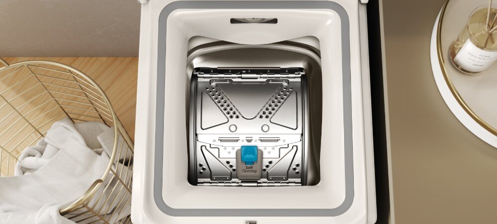 PRALKA WHIRLPOOL MTDLR 65261BS PL/N Kadr ukazuje wnętrze pralki ładowanej od góry, otwartej od góry. Widać konstrukcję bębna przygotowanego do załadunku energooszczędność skuteczne pranie 6,5 kg 12 programów