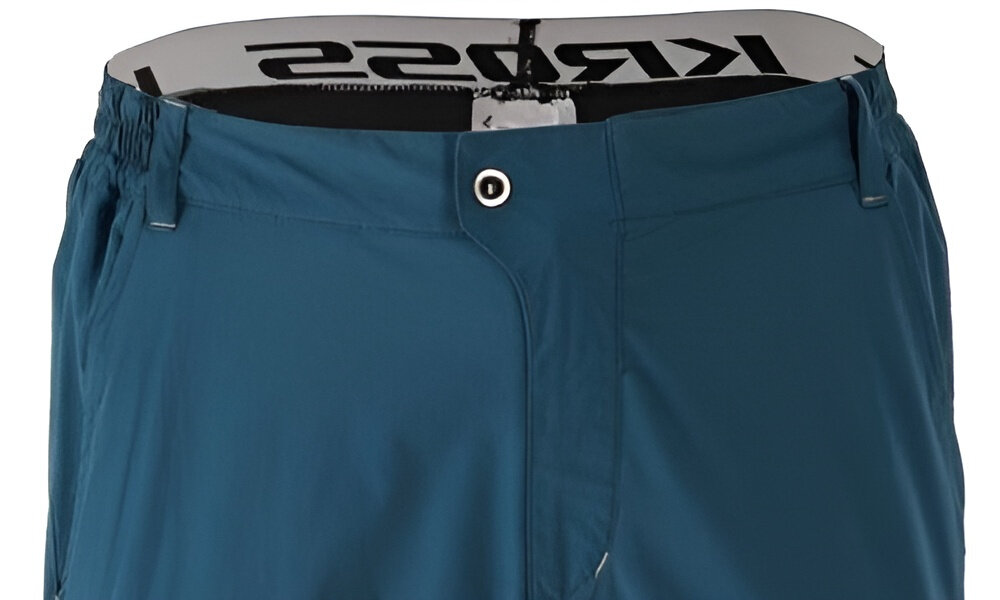 Spodenki rowerowe KROSS Enduro Jekyll (rozmiar S) Niebieski spodenki na białym tle widoczne od przodu zbliżenie na pas z połączenia poliestru i nylonu odporność na przetarcia uszkodzenia mechaniczne lekka tkanina cyrkulacja powietrza ciało pozostaje suche i świeże