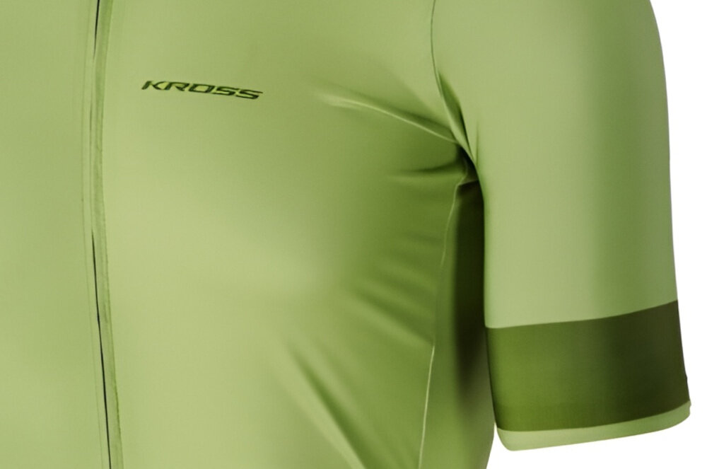 Koszulka rowerowa KROSS Gravel Vojago JRS (rozmiar XL) Zielony zbliżenie na rękawek laserowo cięte rękawki wykończono silikonowym gripem stabilizuje ich ułożenie komfort podczas dynamicznej jazdy równomierne przyleganie koszulki do ciała pełna swoboda ramion