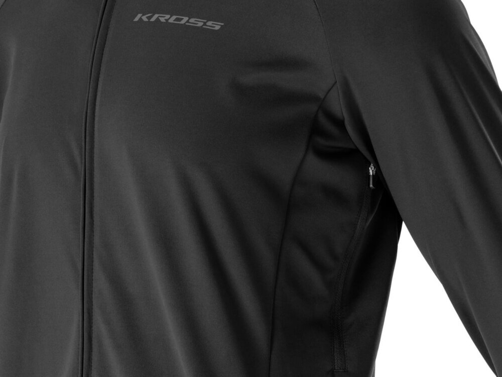 Kurtka rowerowa KROSS Veturo (rozmiar XL) Czarny kurtka na białym tle widoczna od przodu zbliżenie na rozpięcie pod pachą na wiosenne i jesienne przejażdżki rowerowe ochrona przed wiatrem i deszczem odpowiednia wentylacja rozpięcia pod pachami swoboda ruchu bezpieczeństwo