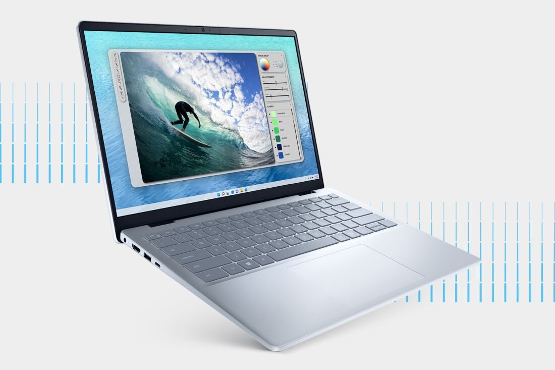 Laptop DELL Inspiron 5440 - Laptop DELL Inspiron 5440 z obrazem surfera na ekranie. Towarzysz zarówno w domu lub biurze 