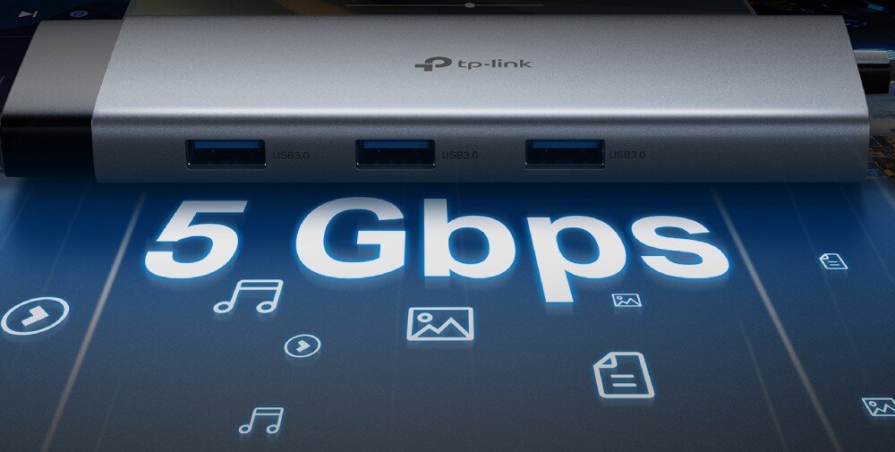 Hub TP-LINK UH9120C Zbliżenie na trzy niebieskie porty USB 3.0 w bocznej obudowie adaptera z dużą grafiką napisu '5 Gbps' na pierwszym planie